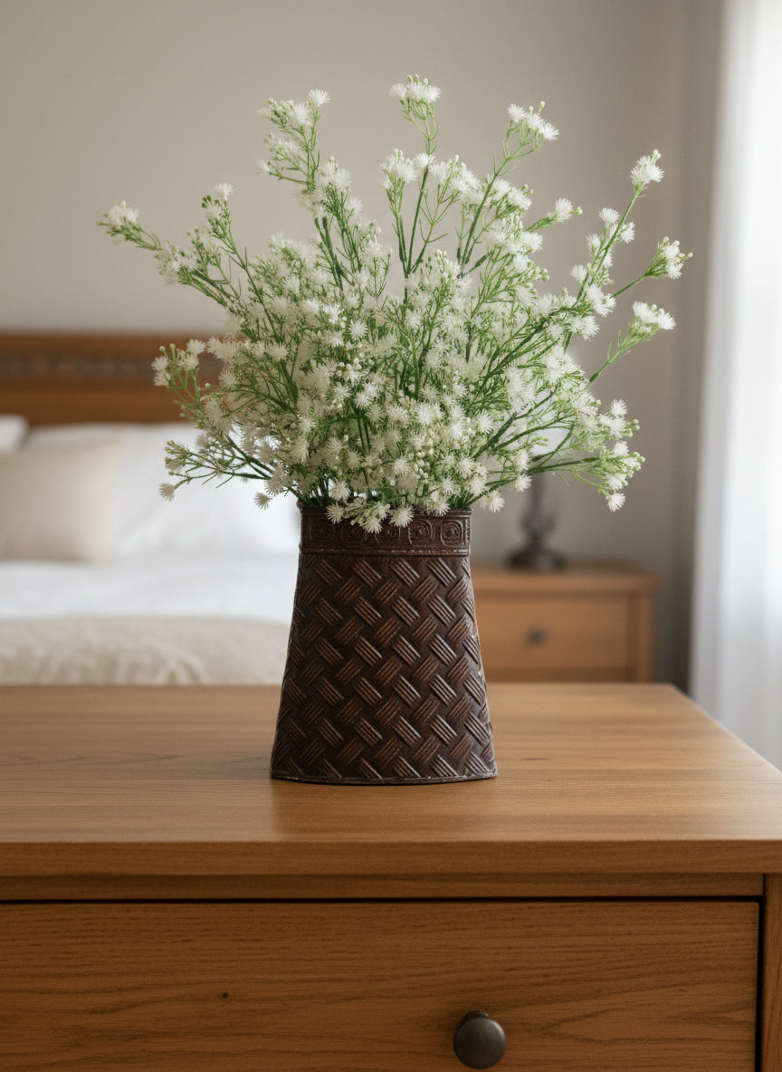 artificial dandelion plant in metal vase