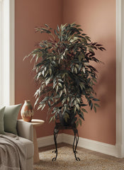 3 Foot Artificial Silk Smilax Tree on Natural wood in a living room.
