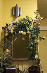 48-inch artificial yellow silk rose vine with butterflies, displayed over a mirror