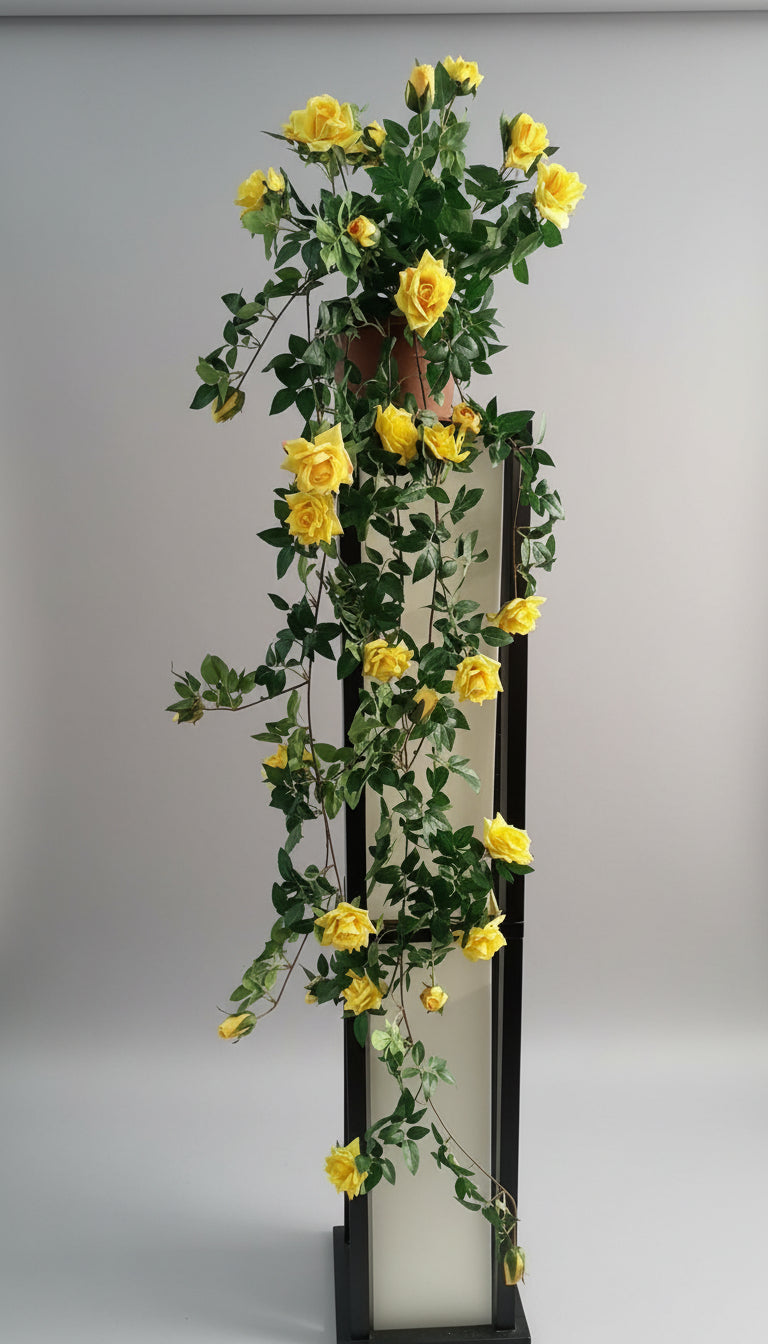 Artificial Silk Yellow Rose Vine – 48" Realistic Trailing Hanging Plant displayed on a decorative container