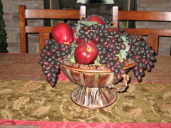 red delicious apples with grapes as a centrepiece for dining room table