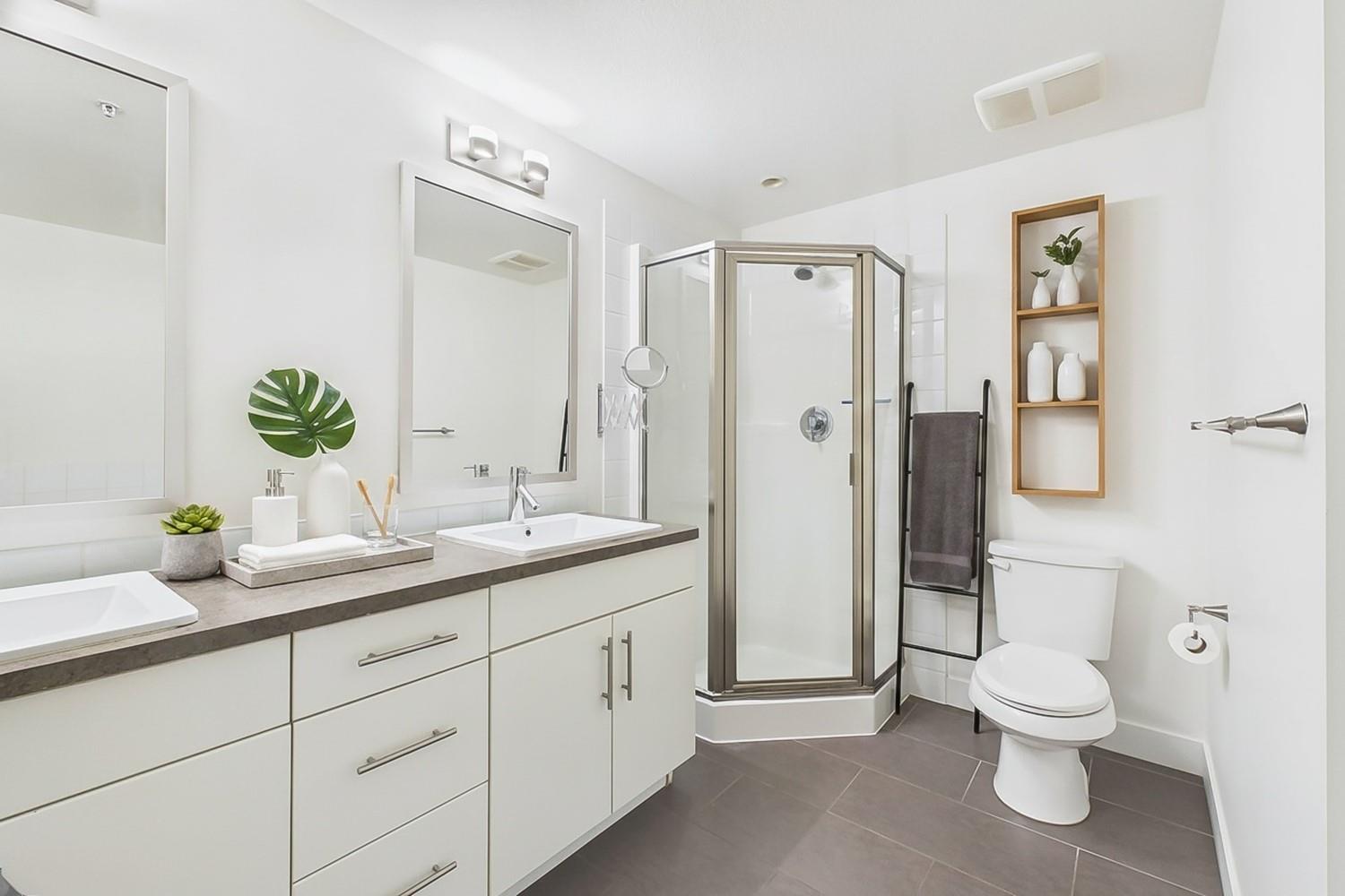 selloum leaf in deco container in bathroom