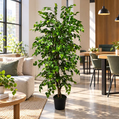 5 Foot Artificial Silk Birch Tree Custom Made on Natural Wood in a bright coworking lounge, displayed in its included grower’s pot.