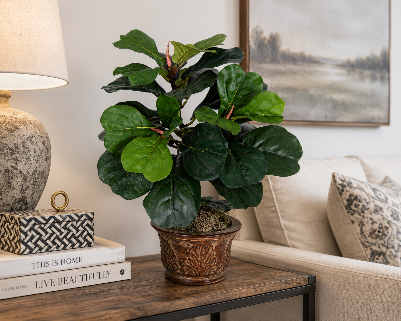 22 Inch Artificial Silk Fiddle Leaf Fig Plant displayed on a table in a contemporary living room