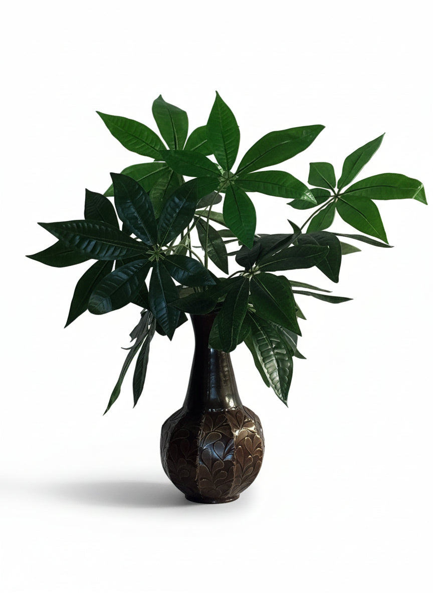 Artificial money tree plant arranged in a decorative metal vase for home or office decor