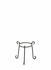 Small circular metal plant stand with curved legs for indoor décor