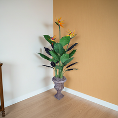 58" Artificial Bird of Paradise Plant adds a "Touch of Tropical Greenery" and makes the flowers pop with the  colored background