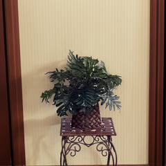 15" Artificial Silk Selloum arranged in a Metal Lattice Table Vase in an hallway